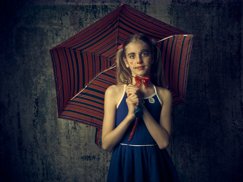 photo of girl with umbrella