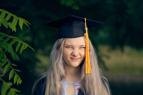 graduation photo of girl in hat